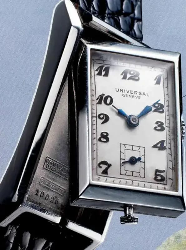 Montre rectangulaire Universal Genève avec aiguilles bleues, chiffres Art déco et bracelet noir