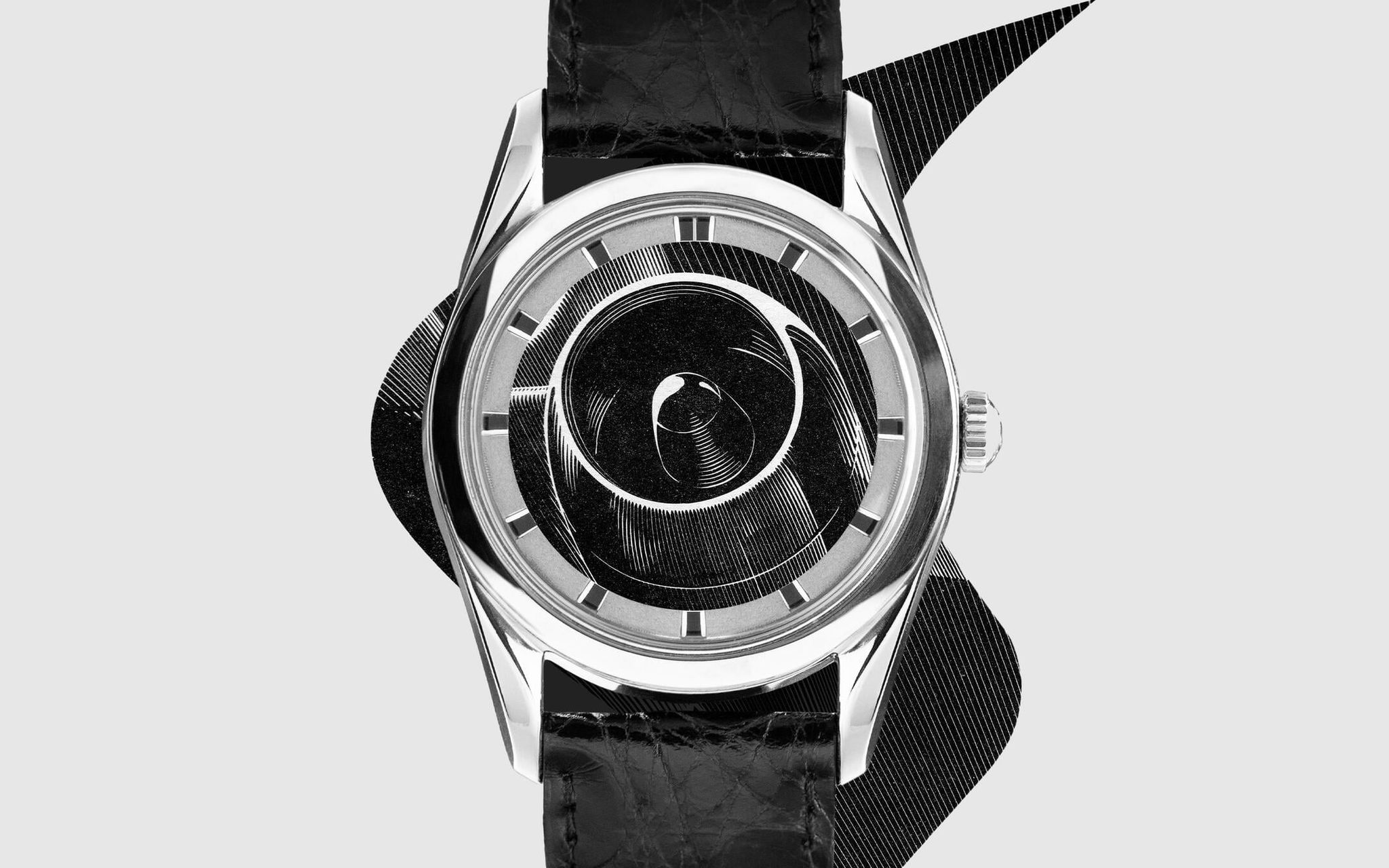 Universal Genève Polerouter avec motif spirale noir, boîtier acier et bracelet cuir noir élégant raffiné